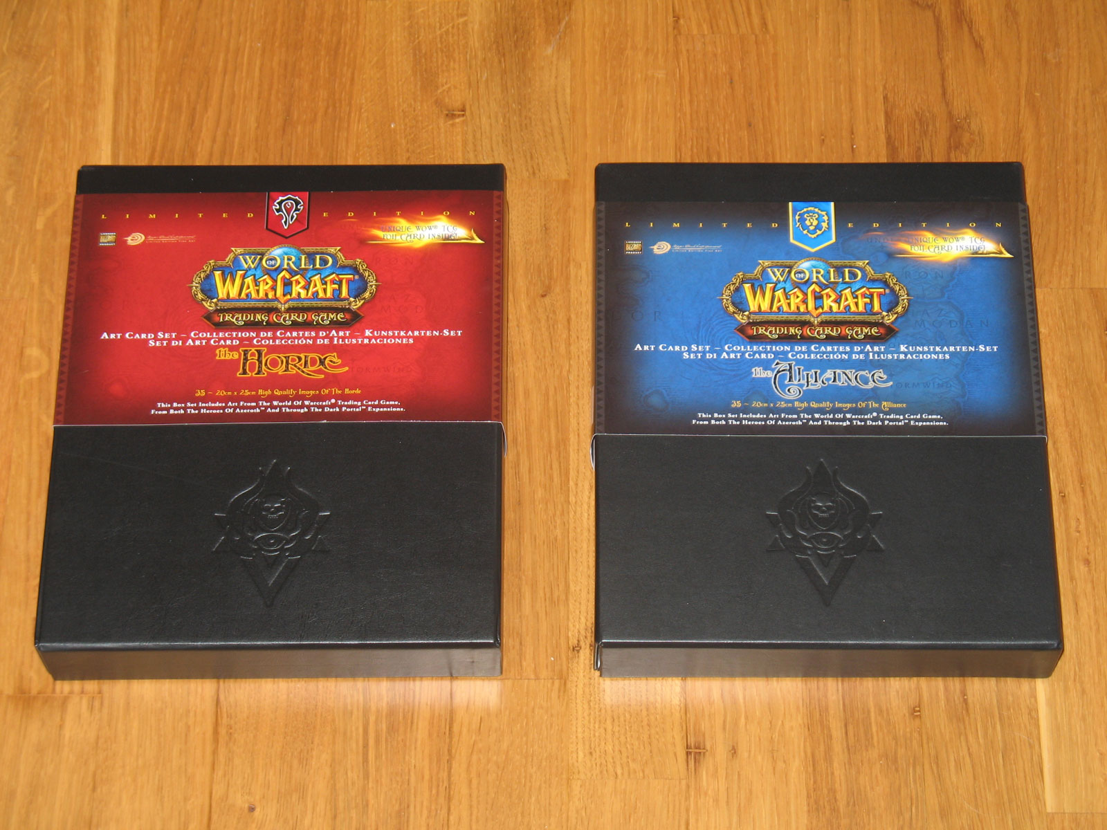 Coffret de cartes d'art Horde et Alliance du JCC World of Warcraft.